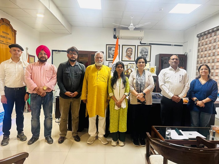 Pic 1 CU Punjab Vice Chancellor Prof. Raghavendra P. Tiwari and officials congratulating Dr. Rubal Kanozia, HoD MCMS, and research scholars.